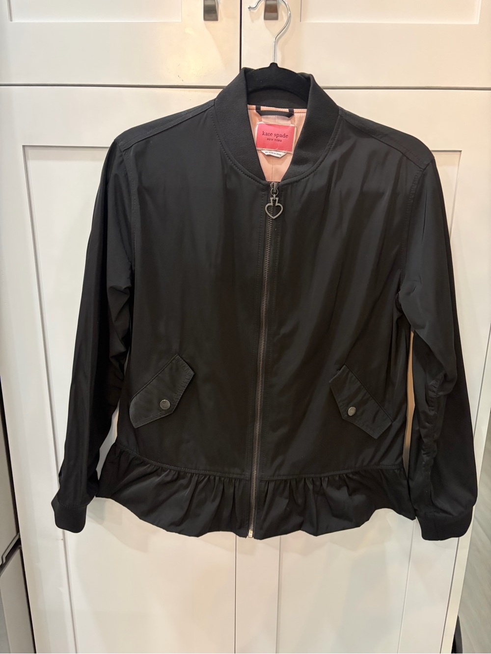 Kate Spade New York ruffled, hem, bomber jacket pink interior lining.